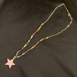 Unique Upcycled Gucci charm on a gold and colored bead chain